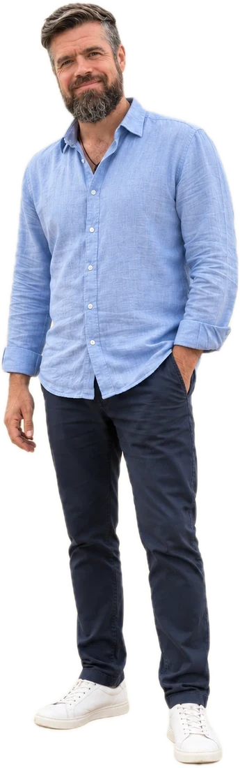 Chris Murray, International Men’s Day Sri Lanka Ambassador, standing in a blue linen shirt and navy trousers